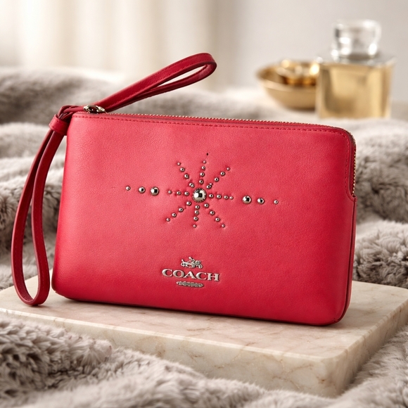 Coach Handbags - Euc Coach Studded Wristlet